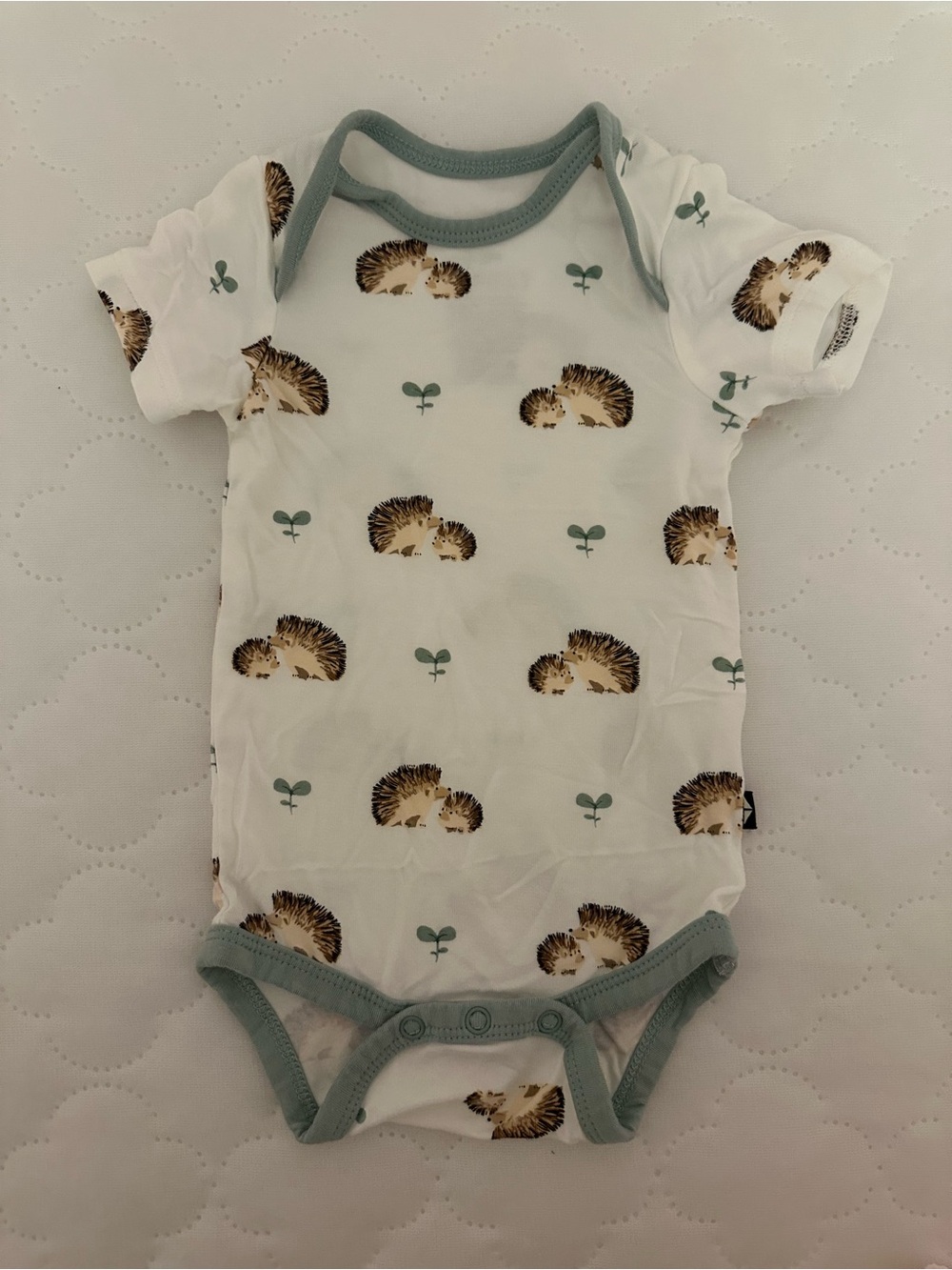 Kyte Baby Hedgehog Print One-Piece Bodysuit in Whiteand Sage